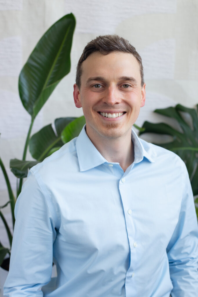 Portrait of Dr. Joel Muller, founder of Lumara Integrative Health, an integrative and trauma-informed therapy practice in Illinois.